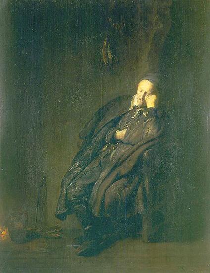  An old man asleep by a fire